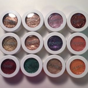 Lot of Colourpop Super Shock Shadows.